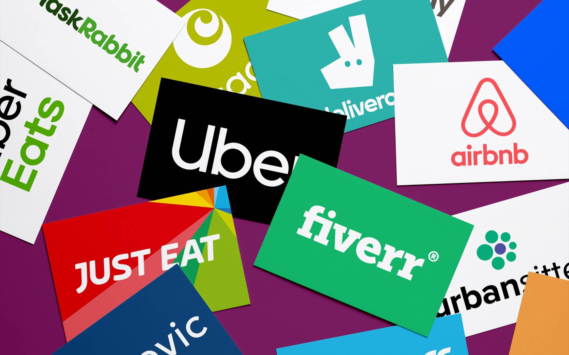 Collage of app-based job logos such as fiverr, Uber, AirBNB, UberEats, and more.